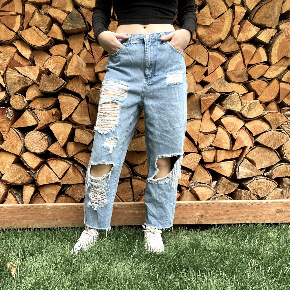 Light blue ripped jeans